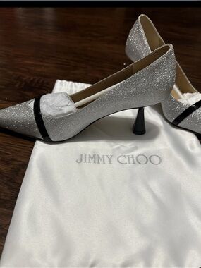 Jimmy Choo Silver Glitter Pointed Pumps with Black Accent